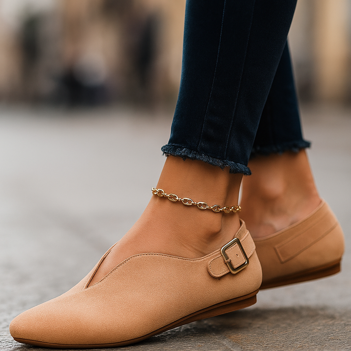 Brown women's buckle loafers, classic and comfortable everyday slip-on flats.
