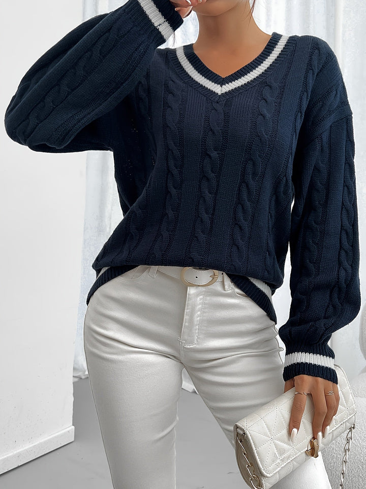 Comfortable women's V-neck cable knit sweater with elegant lantern sleeves. Stylish and warm autumn fashion.