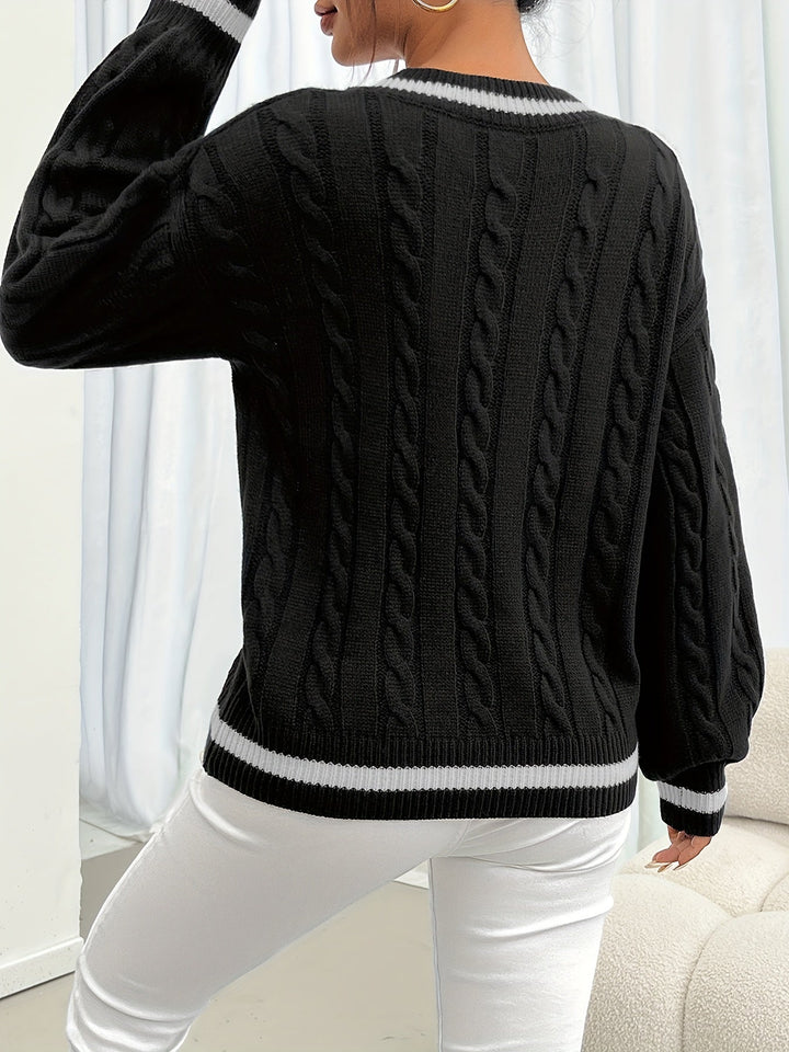 Stylish women's V-neck sweater featuring unique lantern sleeves and classic cable knit texture. Perfect for autumn.