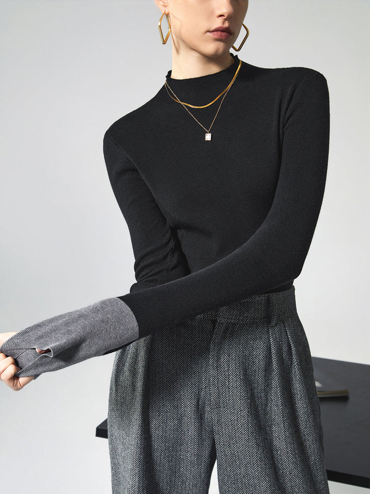 Stylish women's color block long sleeve top, perfect for fall and winter outfits.
