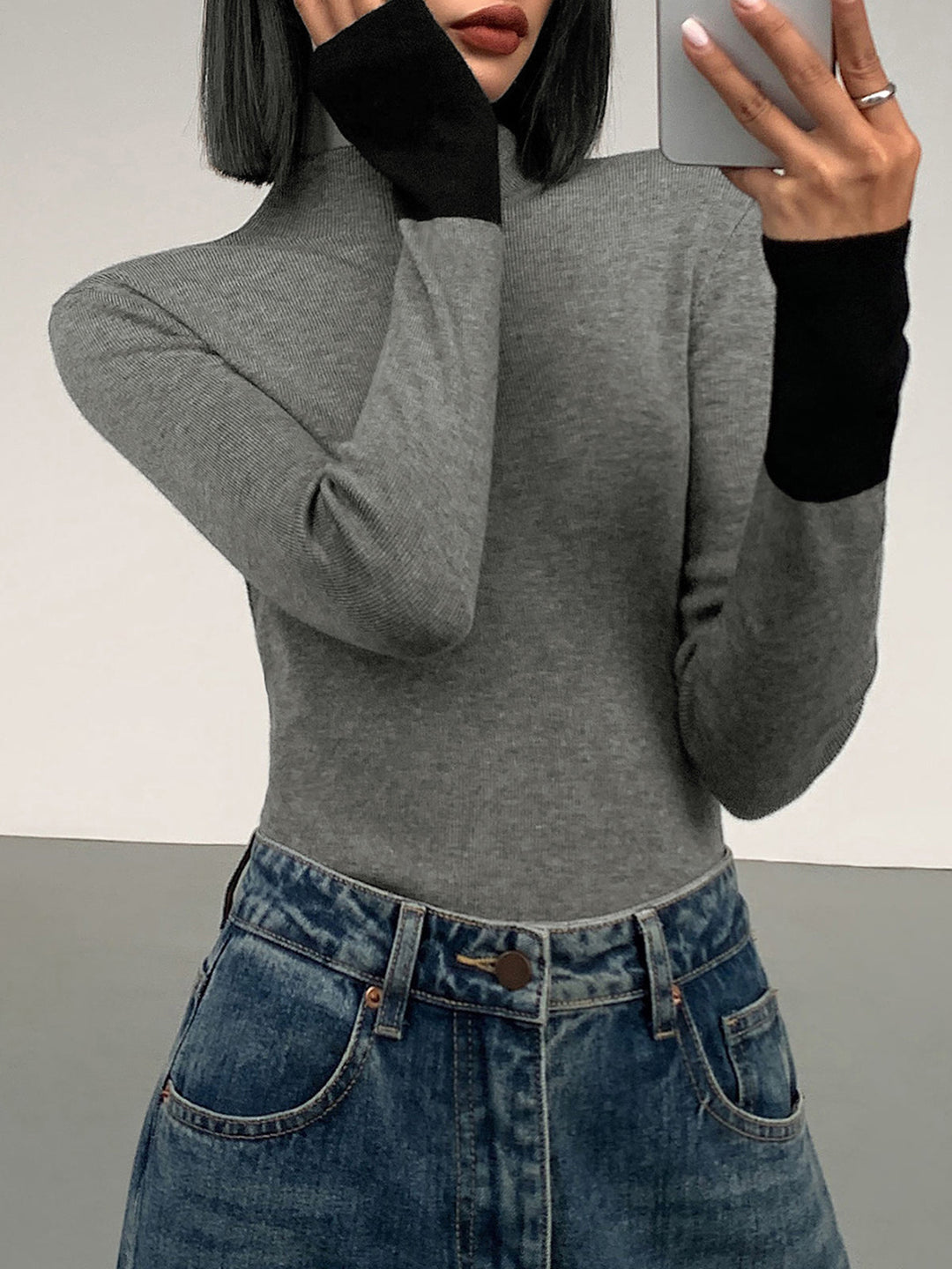 Modern women's long sleeve color block top, an essential for fall & winter casual style.