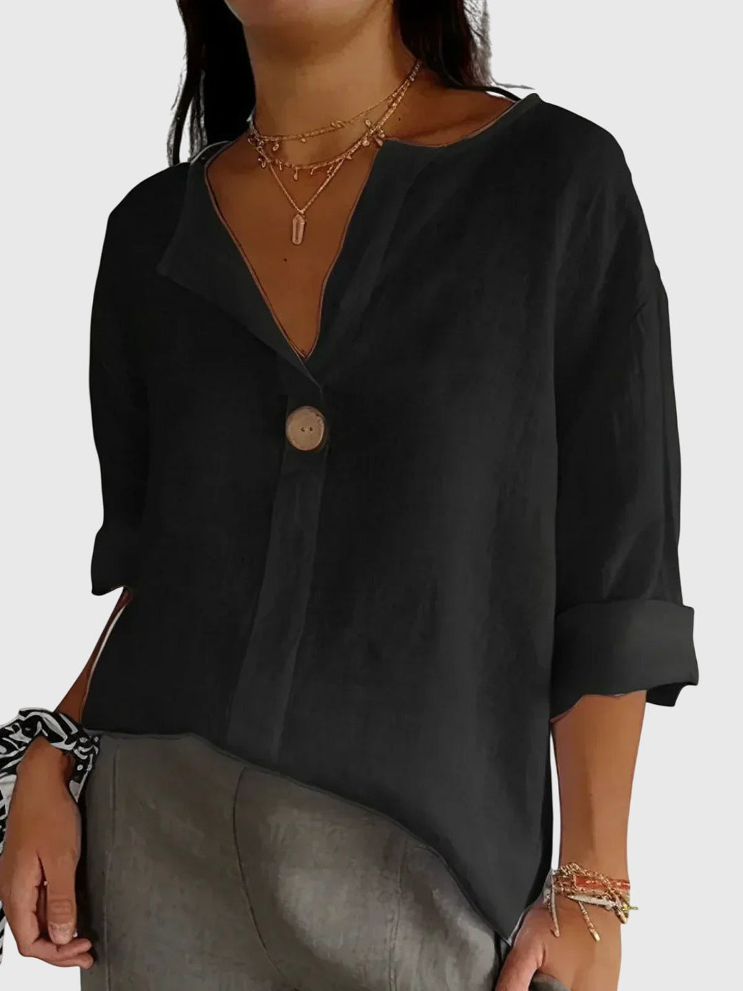 Versatile women's long sleeve blouse for everyday wear. Chic comfort top perfect for any casual or elegant outfit.