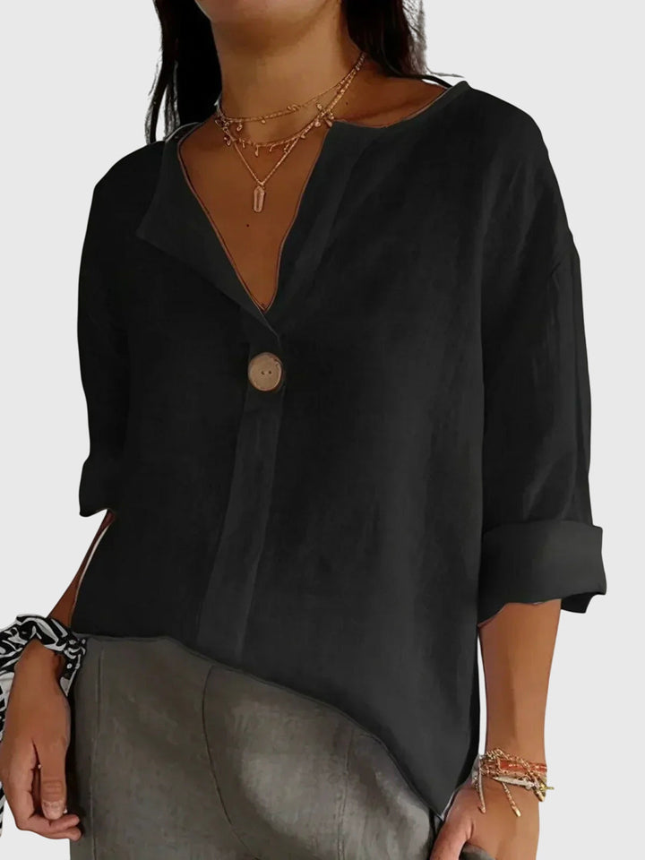 Versatile women's long sleeve blouse for everyday wear. Chic comfort top perfect for any casual or elegant outfit.