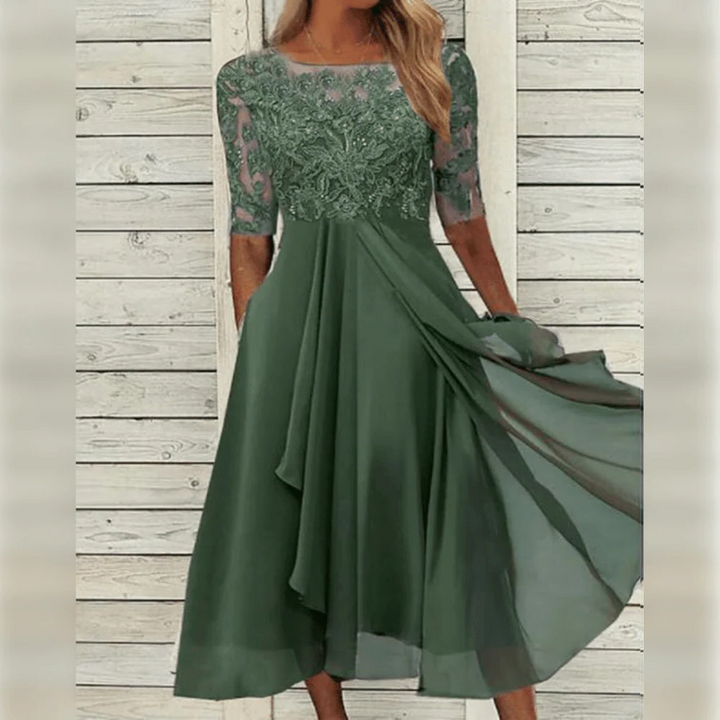 Elegant women's summer dress, ideal for cocktail parties or a chic everyday look.