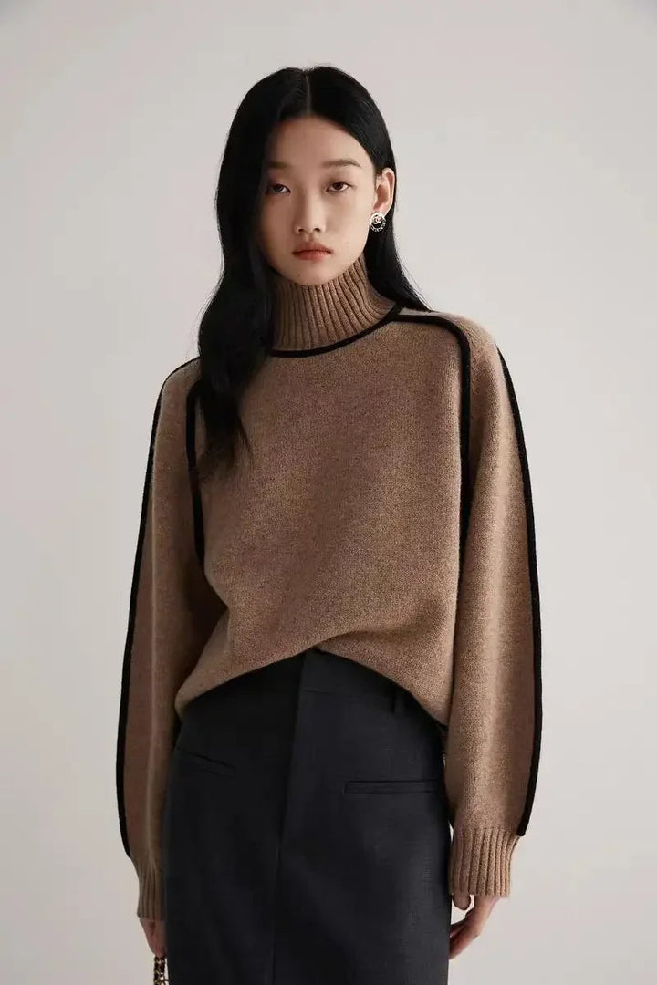 Comfortable women's turtleneck sweater with stylish contrast seams, perfect for versatile autumn & winter layering.