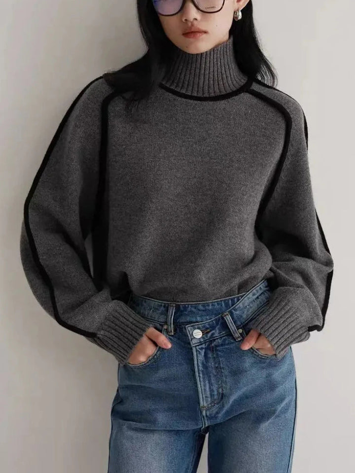 Versatile chic women's contrast seam turtleneck sweater, a comfortable and stylish top for any occasion.
