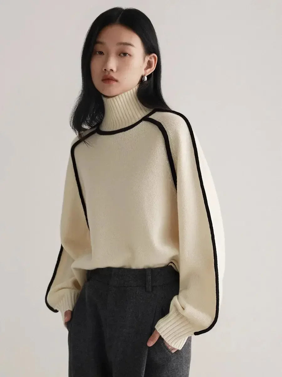 Soft women's contrast seam turtleneck sweater, offering chic style and comfort for autumn & winter outfits.