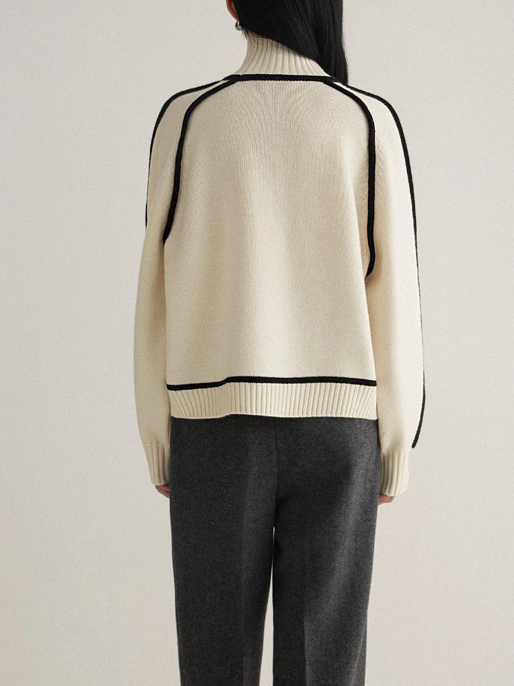Stylish women's turtleneck with unique contrast seams, perfect for elegant office wear or sophisticated casual looks.