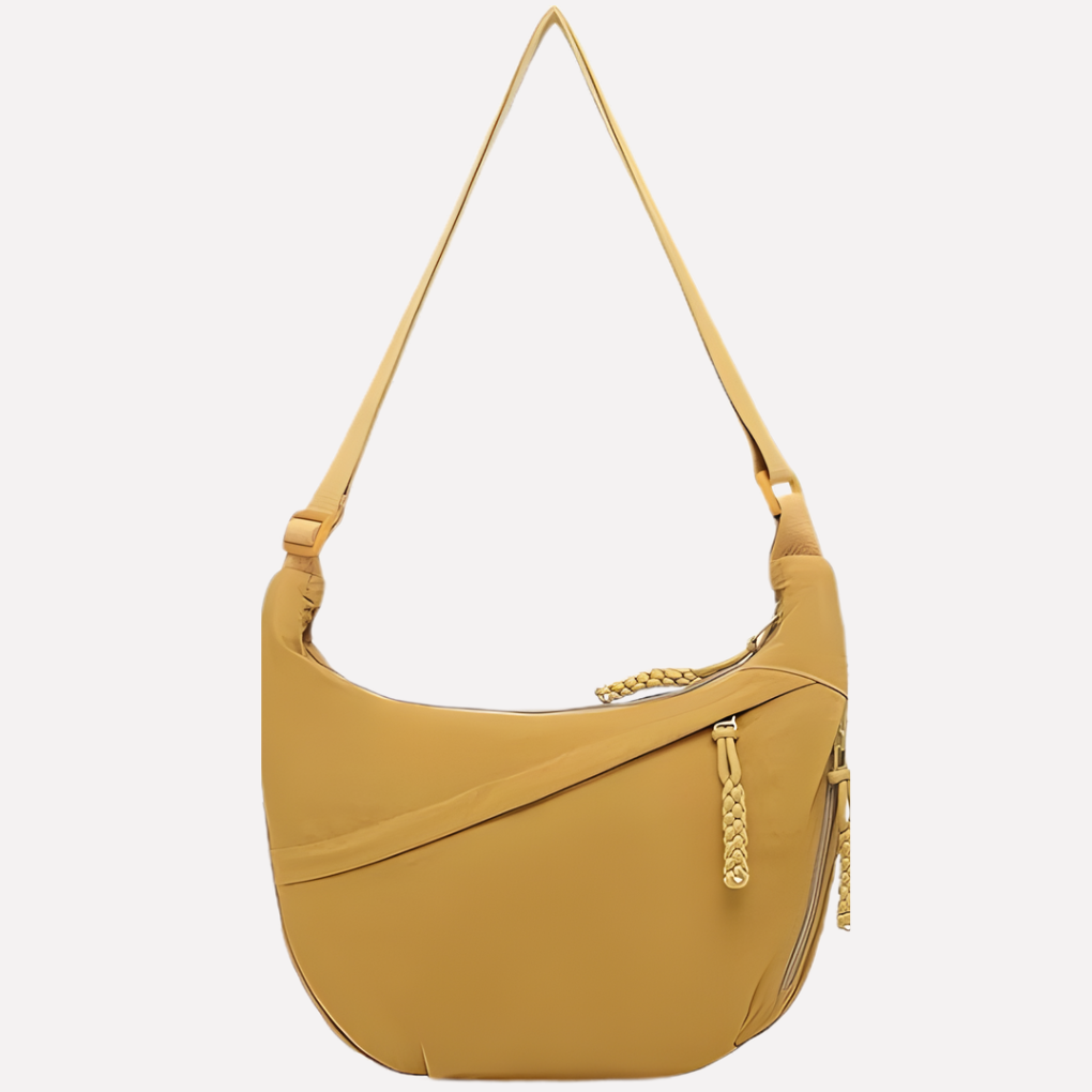 Women's organized crescent shoulder bag, a chic accessory with an adjustable strap for versatile styling.