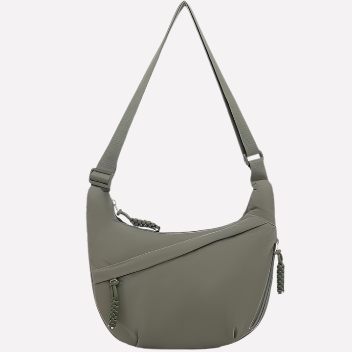 Elegant women's crescent bag with intricate braided detail, a chic accessory for everyday fashion.