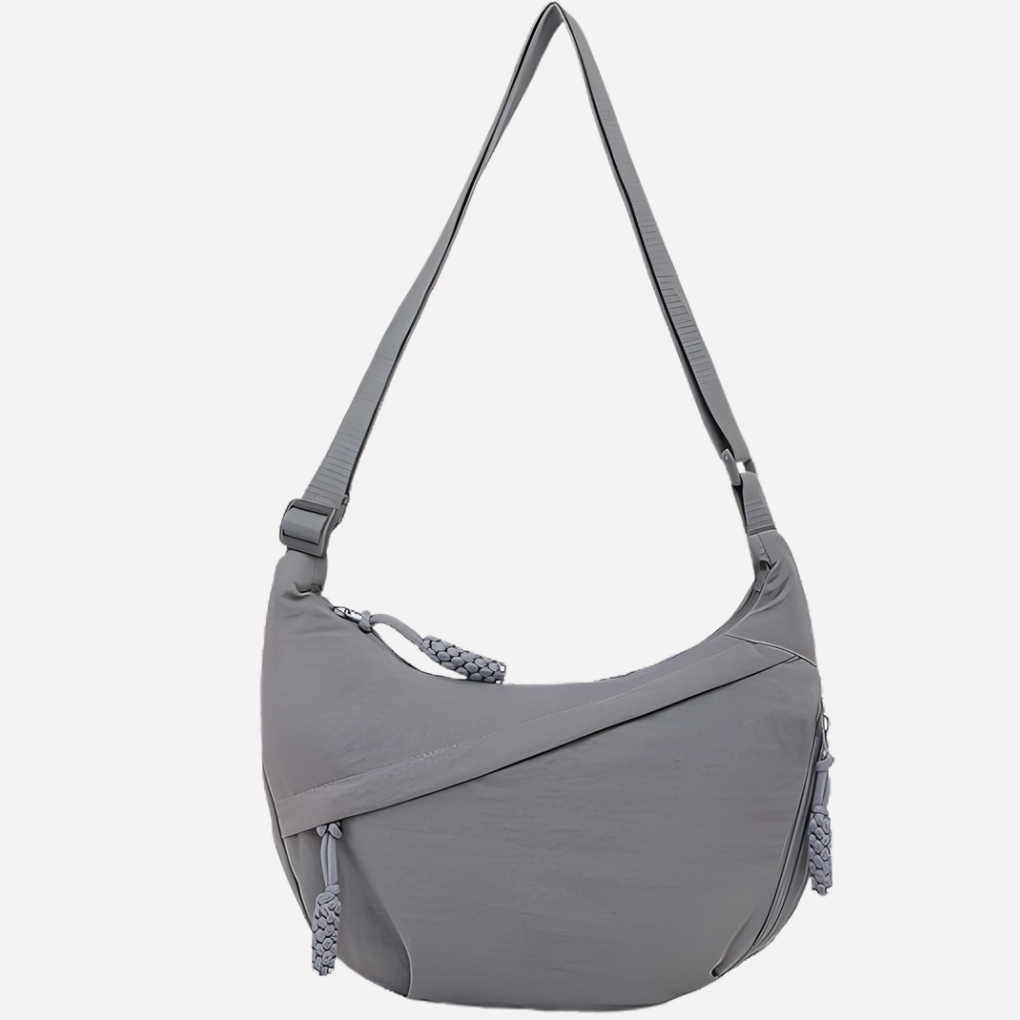 Fashionable women's crescent bag, featuring a comfortable adjustable strap for chic everyday wear.