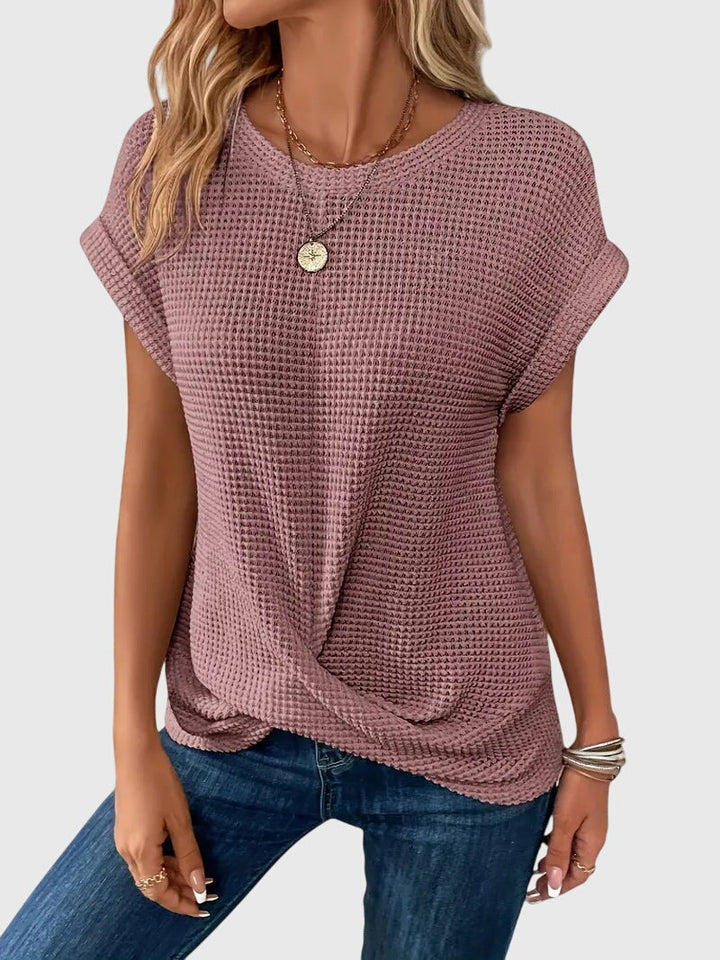 Elegant women's crew neck blouse, soft fabric, long sleeve top. Versatile for casual or workwear in spring/summer.