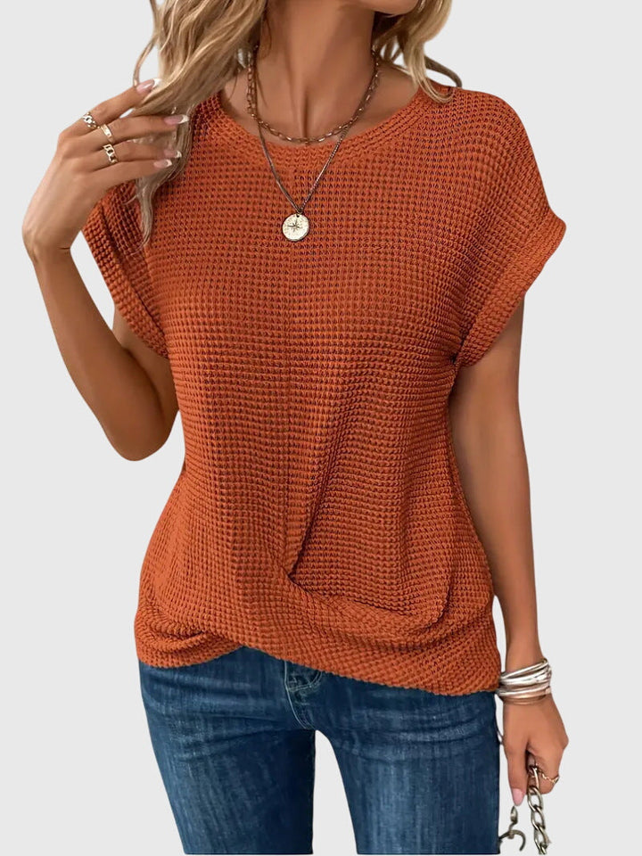Professional women's crew neck blouse for workwear. Elegant long sleeve top, versatile for office & spring/summer.