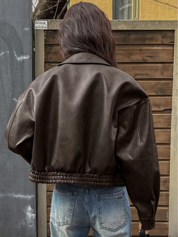 Women's stylish cropped outerwear jacket with a protective stand collar and sleek zip, ideal for transitional weather.