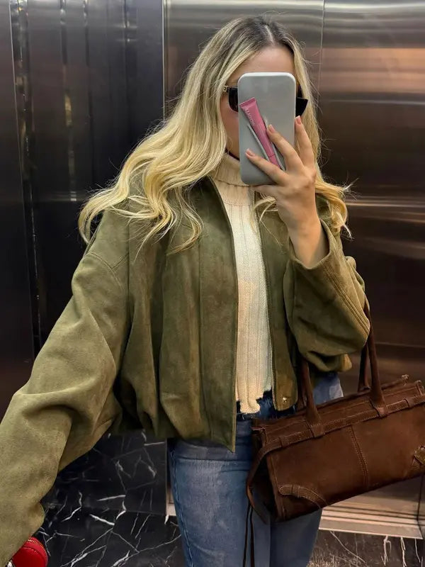Stylish contemporary women's cropped jacket, a modern fashion essential for women.