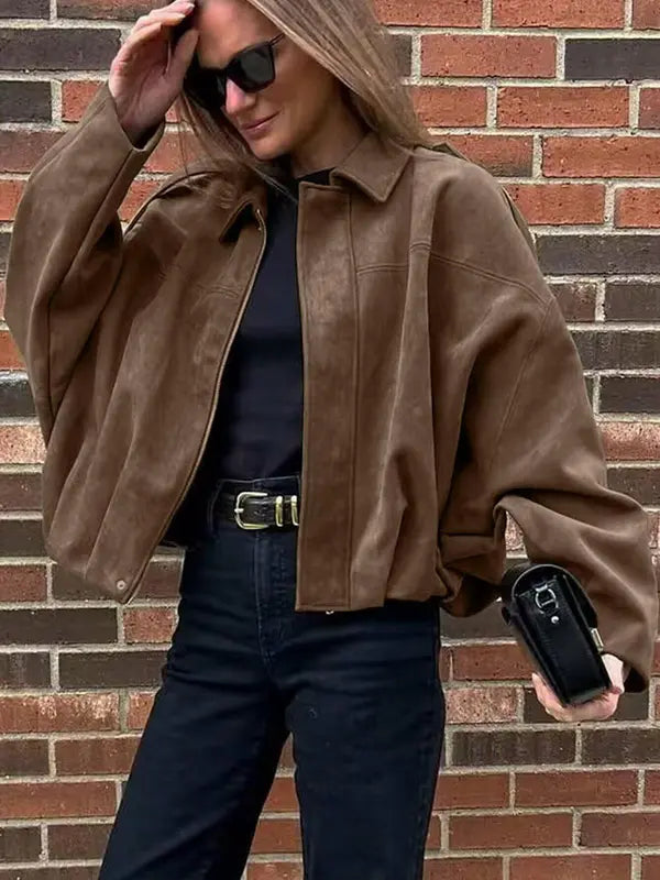 Statement women's cropped jacket, adding effortless style & modern flair to any outfit.
