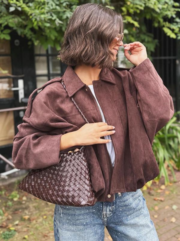 Structured & versatile women's cropped jacket, offering chic modern outerwear.
