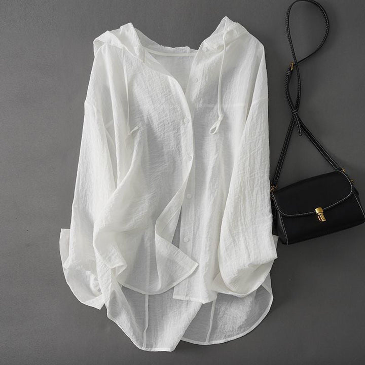 Women's chic drawstring hoodie top, relaxed fit, perfect for casual spring/summer wear. Comfortable and stylish.