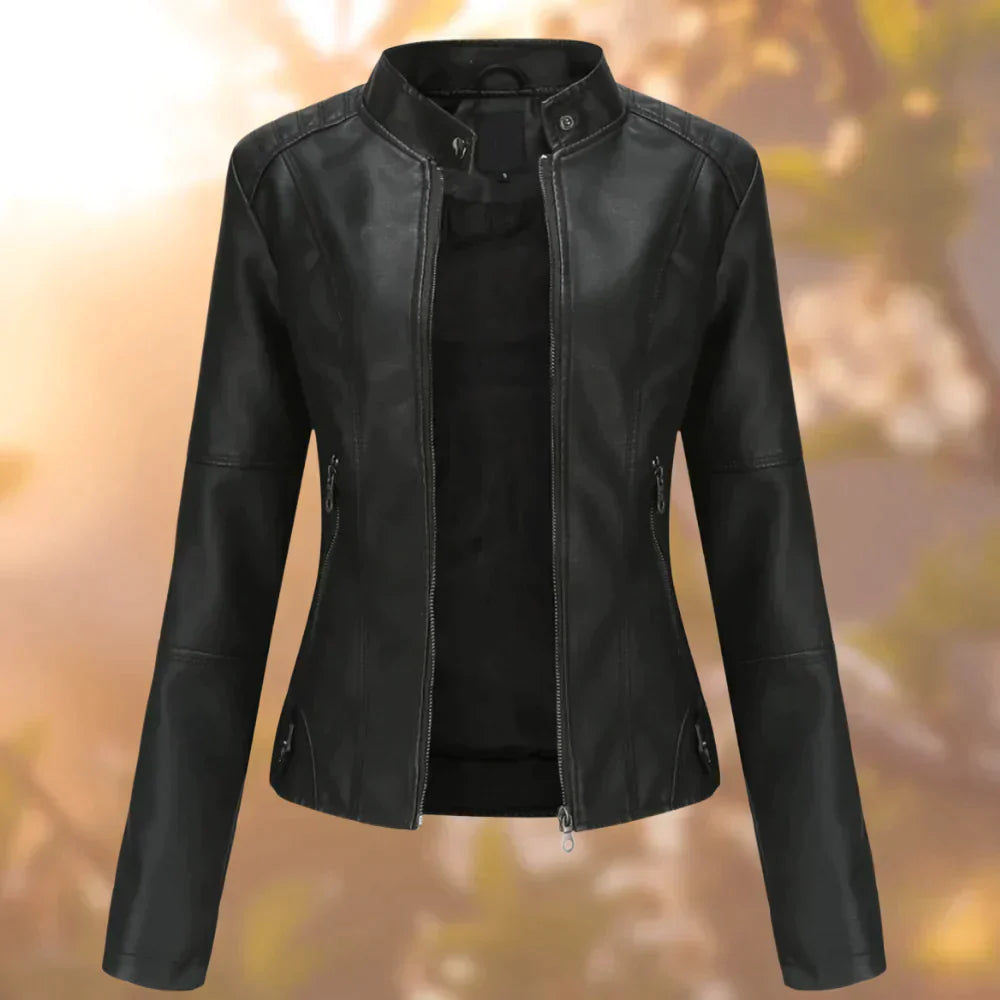 Women's chic edgy modern biker jacket. Versatile black faux leather outerwear for all seasons, a fashion statement.