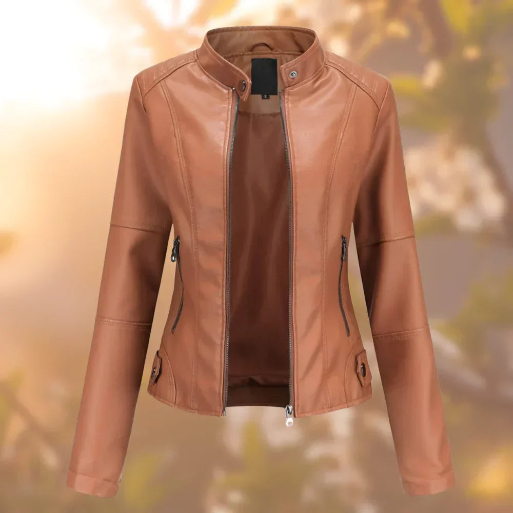 Black women's modern biker jacket. Edgy fashion apparel with a versatile style, ideal for all-season wear.