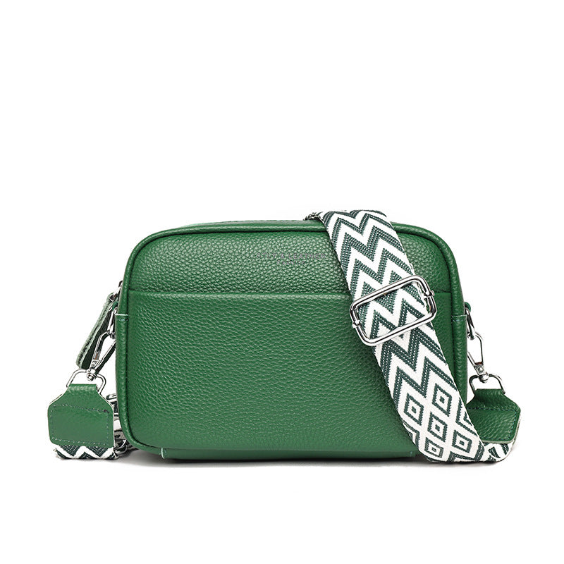 Woman enjoying a cafe moment with her modern crossbody bag, a stylish everyday and travel companion.