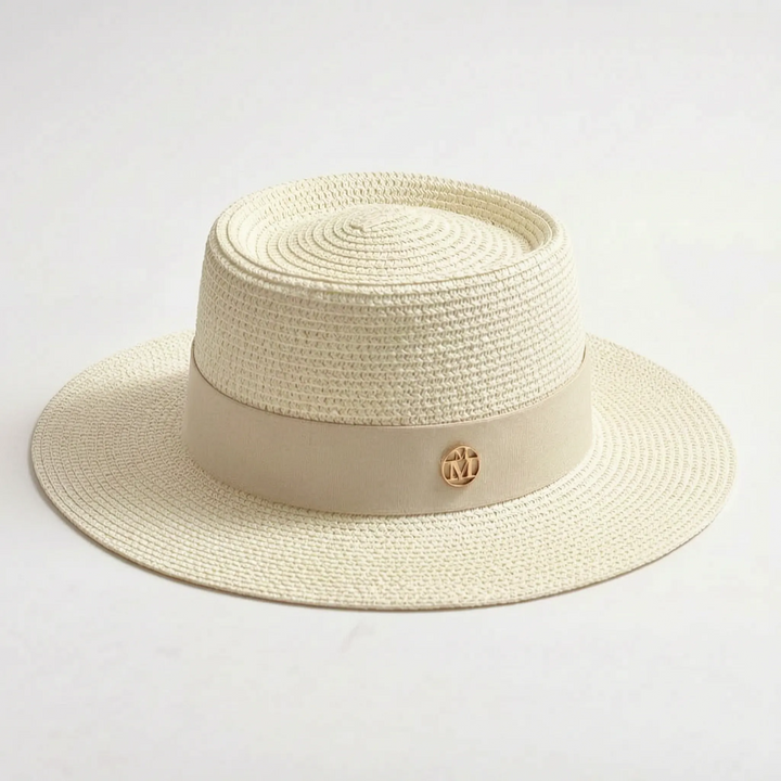 Women's summer sun hat. Wide brim & flat top offer chic style & sun protection for vacation.