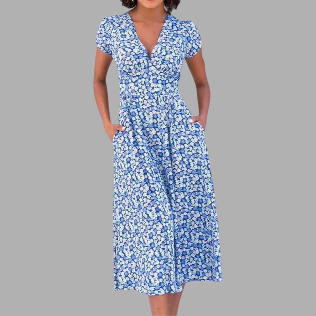 Women's chic floral midi dress with V-neck, short sleeves, and practical pockets, perfect for summer casual elegance.