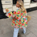 Lightweight women's spring jacket with a stylish floral print. Perfect for casual & chic outfits.