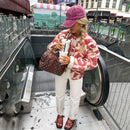 Versatile women's floral spring jacket. Chic printed outerwear for seasonal fashion.