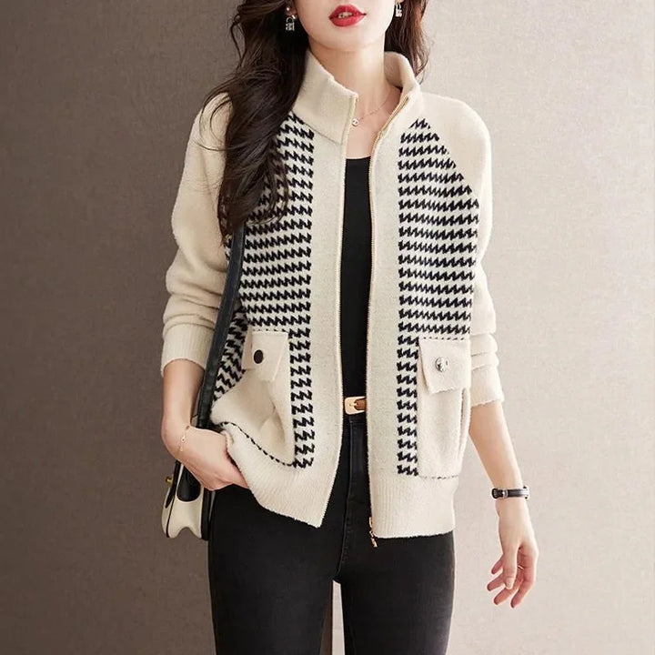 Women's chic houndstooth zip jacket. Effortless style, perfect for layering and versatile fashion outerwear.
