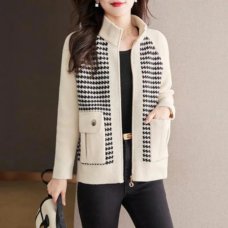 Versatile women's houndstooth zip jacket with a relaxed fit. Chic outerwear for effortless style & layering.