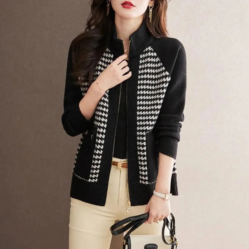 Women's apparel: elegant houndstooth zip jacket. A chic outerwear piece, perfect for a fashionable layering look.