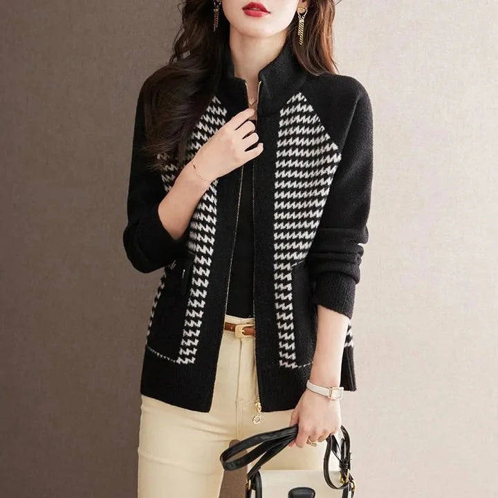 Women's apparel: elegant houndstooth zip jacket. A chic outerwear piece, perfect for a fashionable layering look.