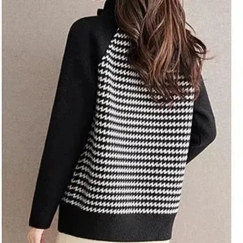 Chic women's houndstooth zip jacket. Versatile outerwear with a relaxed fit for effortless style and layering.