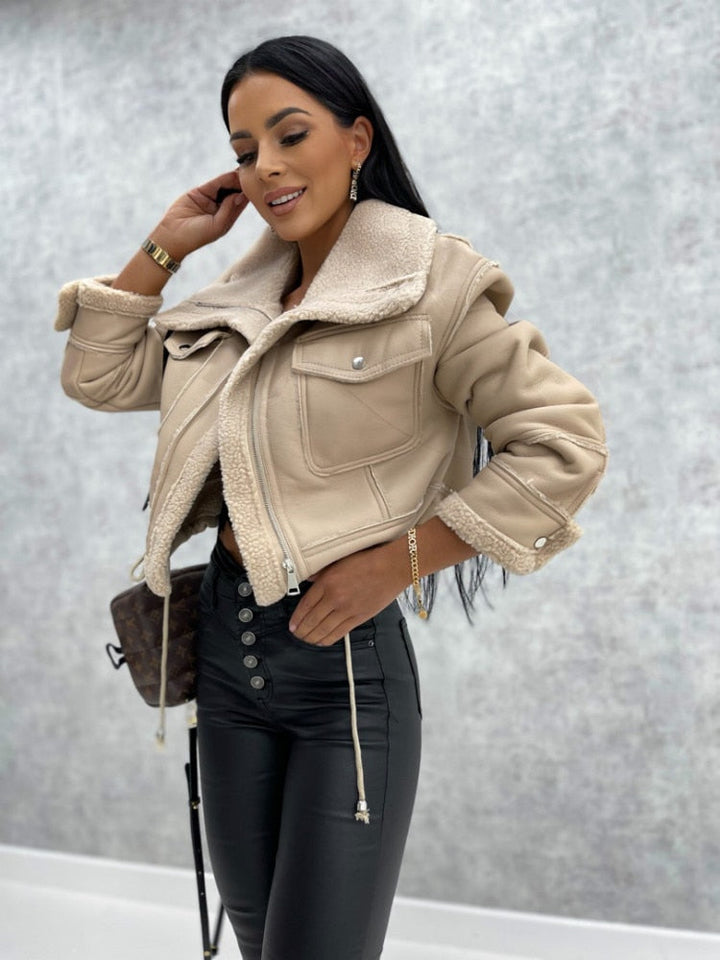 Fashionable women's lapel motorcycle jacket. Chic outerwear with zipper, perfect for fall & casual style.