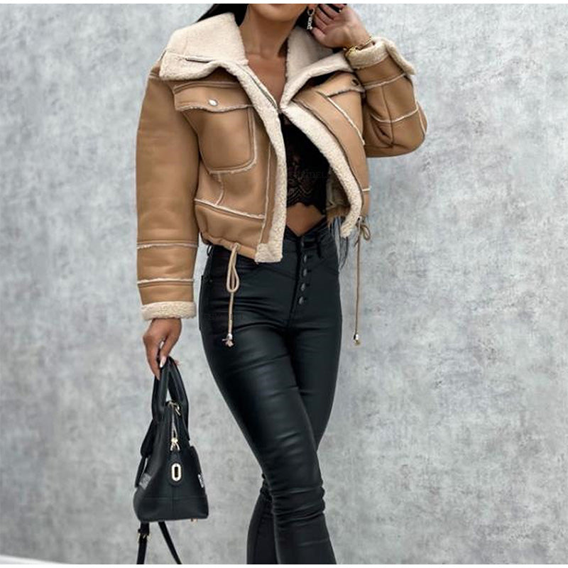 Woman in a chic lapel motorcycle jacket. Stylish & comfortable casual outerwear with sherpa lining for fall/winter.