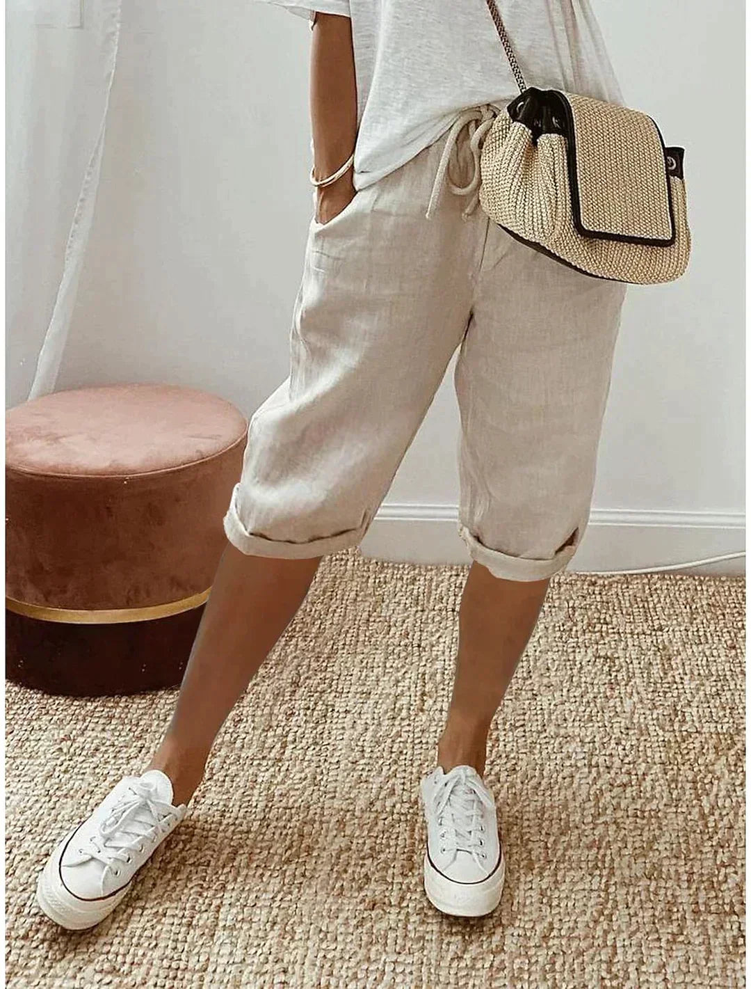 Women's chic linen summer trousers, perfect for elegant comfort on warm days. Versatile & stylish everyday pants.