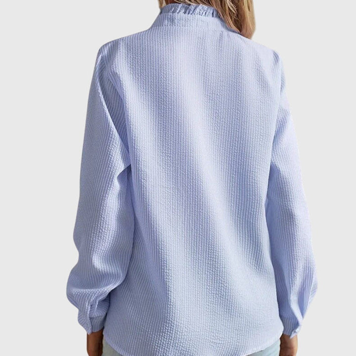 Modern women's chic blouse, an elegant top for versatile spring & summer outfits. Comfortable long-sleeve design.