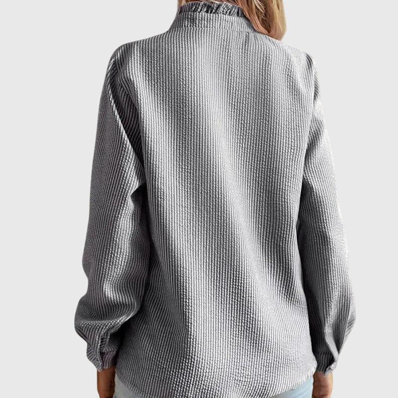 Women's modern long-sleeve blouse. Chic and elegant top, perfect for versatile spring, summer, office, or casual wear.