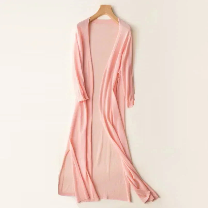 Fashionable women's long-sleeve cardigan, ideal winter style outerwear for warmth.