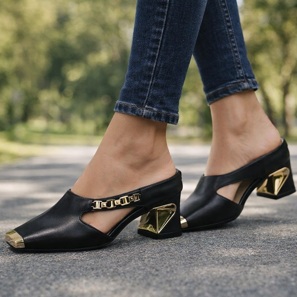 Stunning women's high heels featuring a unique metal toe. Statement evening shoes with gold detail.