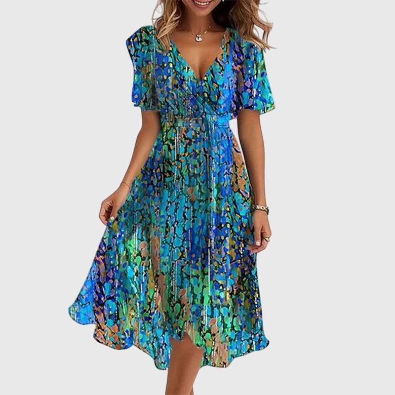 Women's chic midi dress with v-neck and flattering fit, perfect for elegant summer style or versatile party wear.