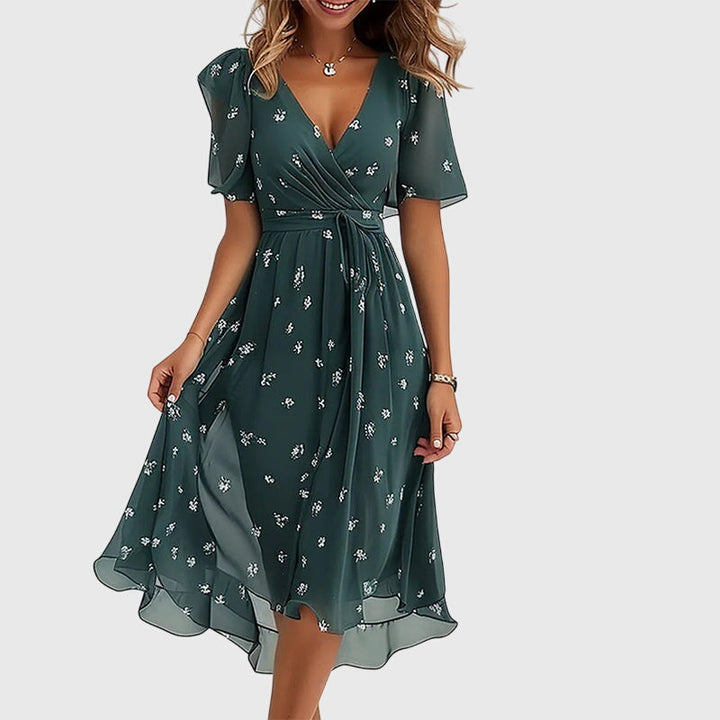 Chic women's midi dress showcasing effortless style and an elegant, flattering fit, perfect for any summer event.