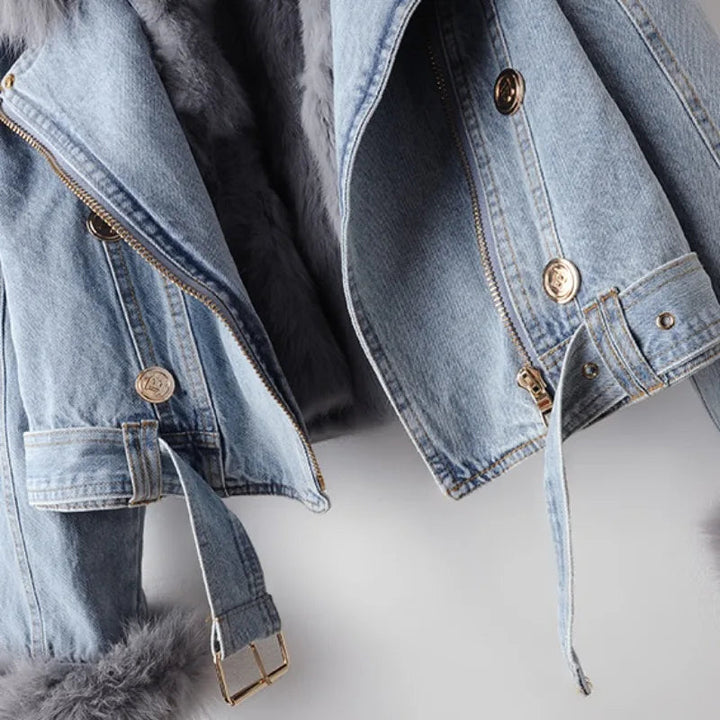 Elegant women's moto jacket with an adjustable fit and luxurious plush collar. Ideal for chic outerwear.