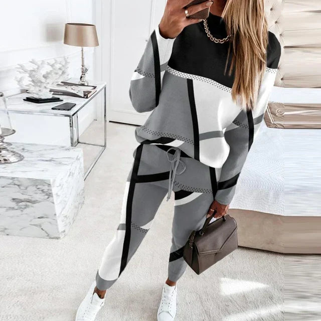 Women's chic O-neck top & long pants 2-piece set. Comfortable, versatile everyday fashion.