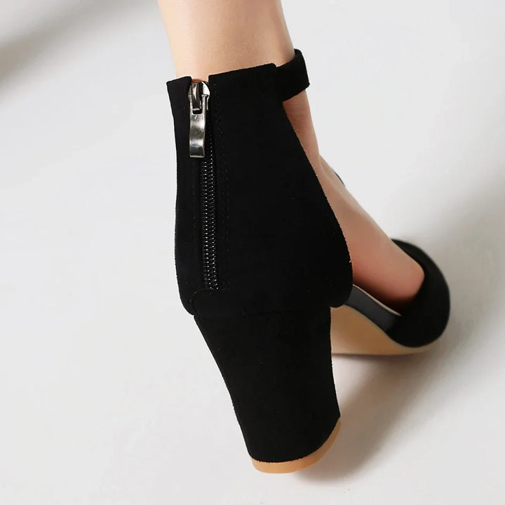 Women's elegant open-toe block heels. Comfortable and chic footwear with sturdy design.