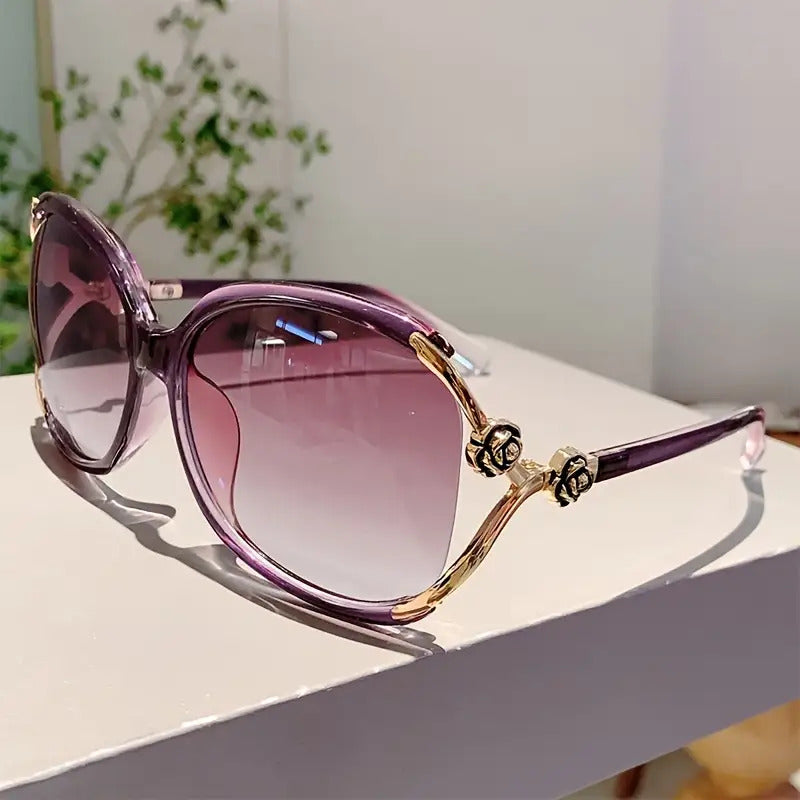 Women's elegant oversized sunglasses featuring gradient UV protective lenses; a sophisticated accessory.