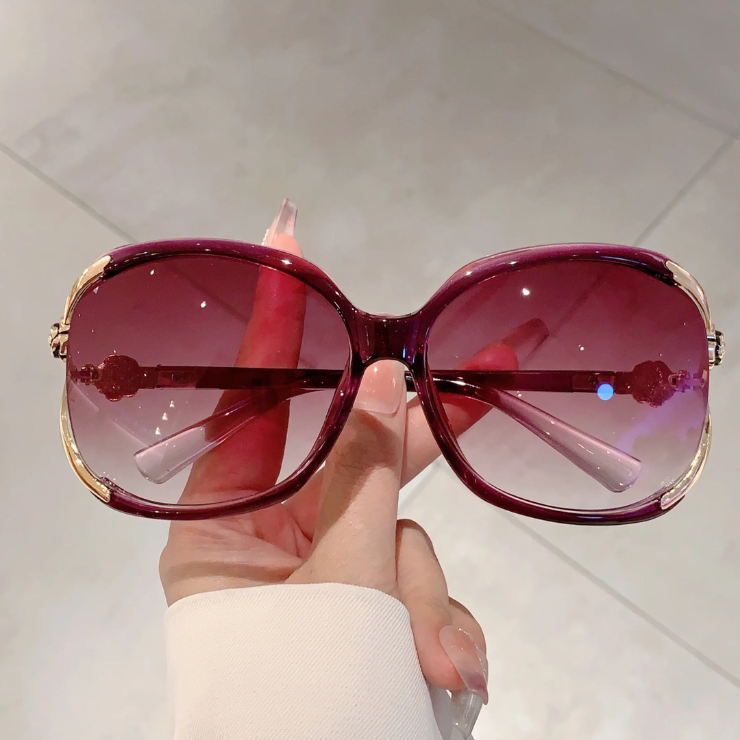 Oversized women's fashion sunglasses, gradient UV lenses, and a chic, durable acetate frame.