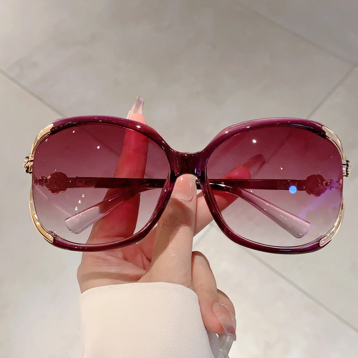 Oversized women's fashion sunglasses, gradient UV lenses, and a chic, durable acetate frame.