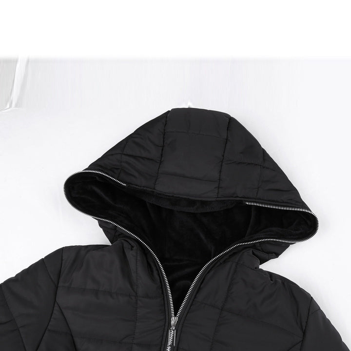 Elegant women's padded Mila coat. Long, warm winter jacket designed for chic ladies fashion and comfort.
